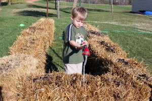 Frequent Watering of Straw Bales