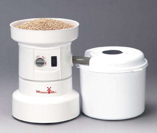 How do you assemble the grain mill?