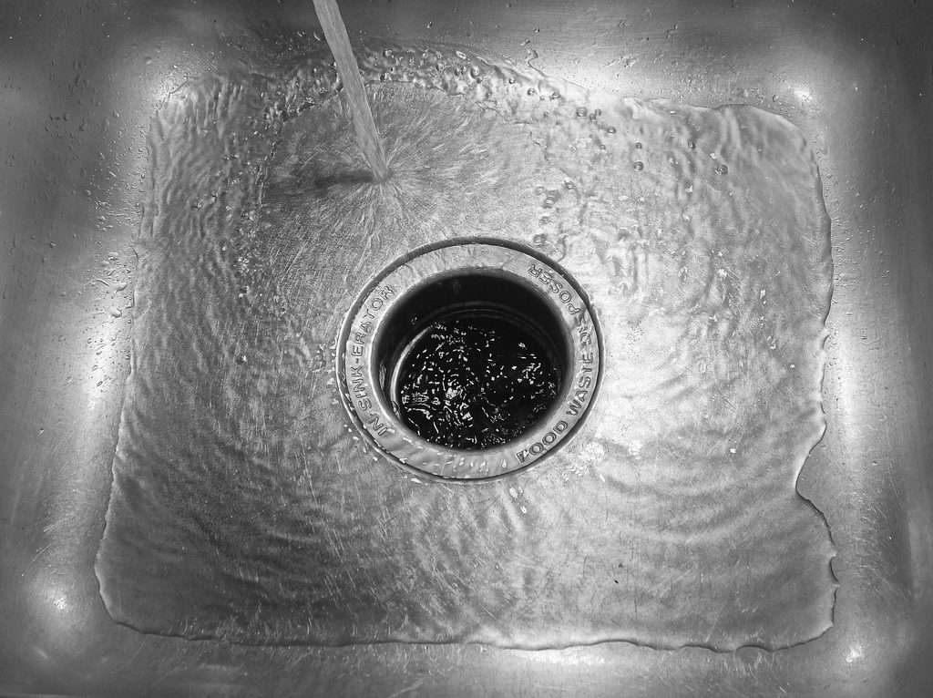 water running in kitchen sink