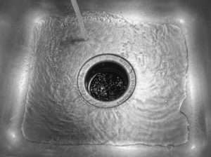 water running in kitchen sink